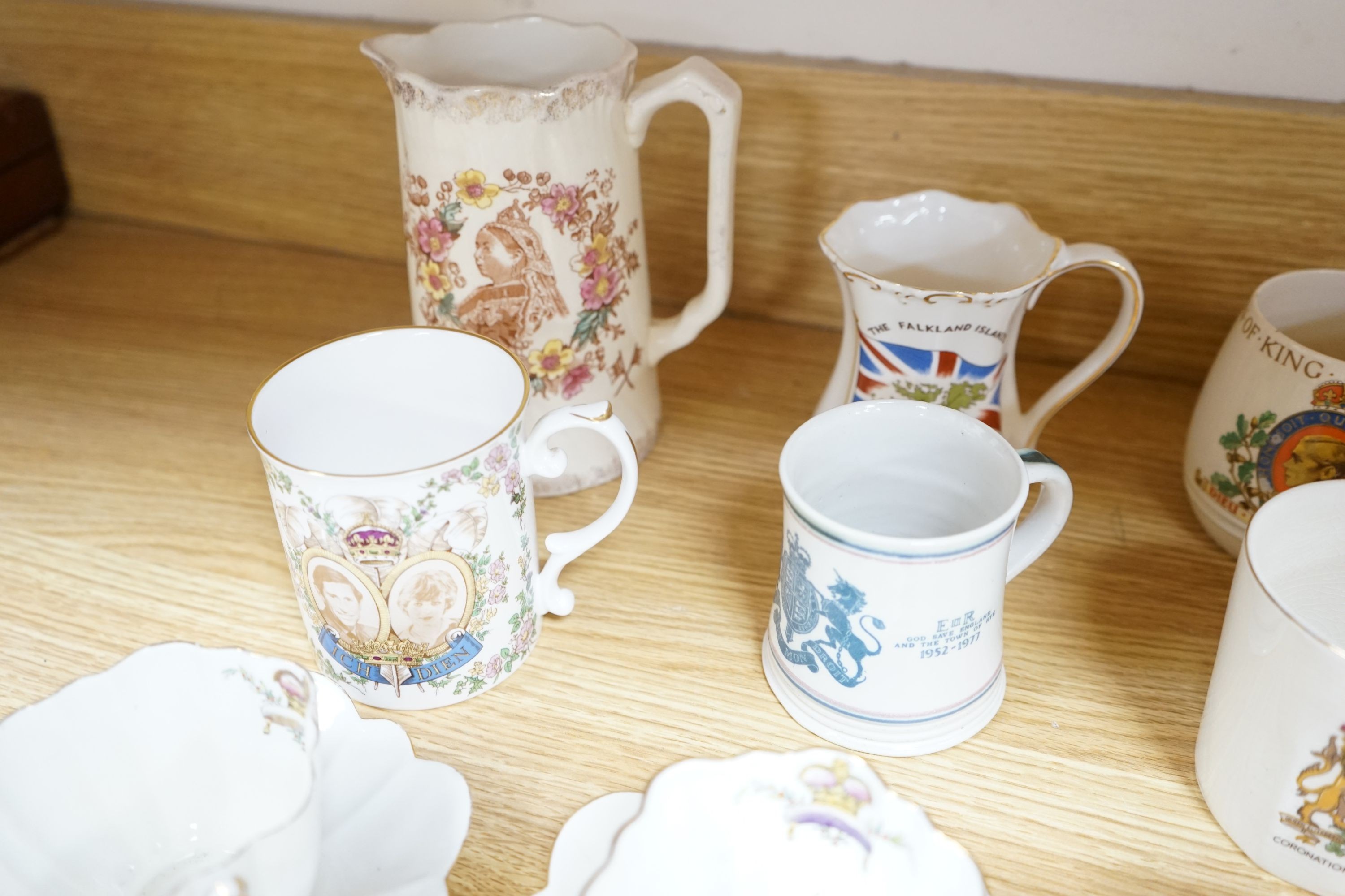 Royal commemorative ceramics and five mid 19th century Staffordshire porcelain models of cottages, etc.